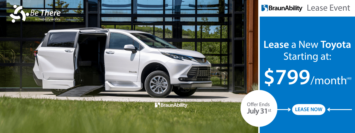 White BraunAbility accessible Toyota minivan with open side door parked outside; lease offer advertised at $799/month until July 31.