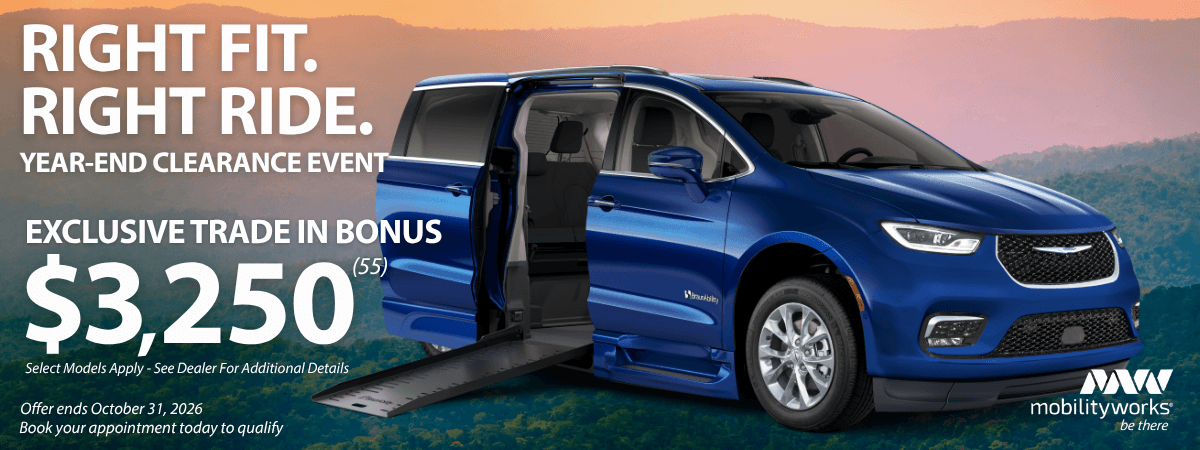 A blue wheelchair-accessible minivan with its side door and ramp open, advertising a $3,250 trade-in bonus, year-end clearance event, and the MobilityWorks logo.