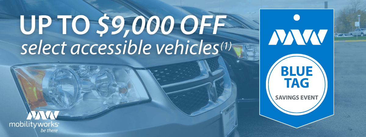 Close-up of accessible vehicles in a lot with a banner reading Up to $9,000 off select accessible vehicles and a Blue Tag Savings Event badge.