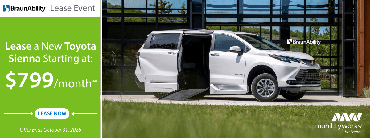 White BraunAbility Toyota Sienna minivan with ramp extended, parked outside a building. Enjoy MobilityWorks promotions—lease for $799/month, offer ends October 31, 2026.