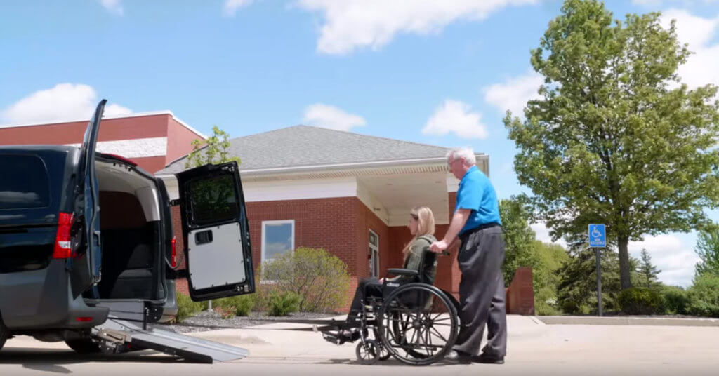 AMF Bruns Easy Pull winch system pulling wheelchair into back of rear entry van