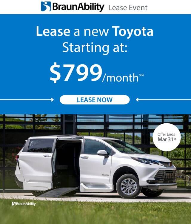 White BraunAbility accessible minivan with side ramp extended, parked outside a modern building. Text promotes Toyota lease from $799/month, offer ends March 31.
