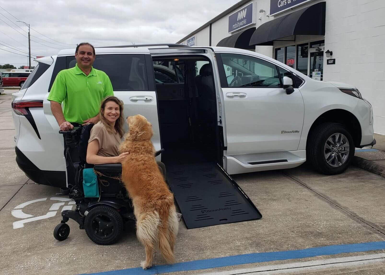 Paul with a happy customer and a dog!