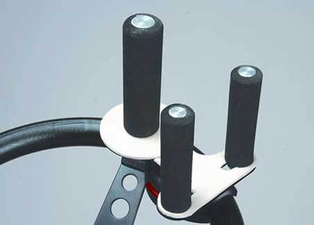 A tri-pin steering aid with 3 black foam pins