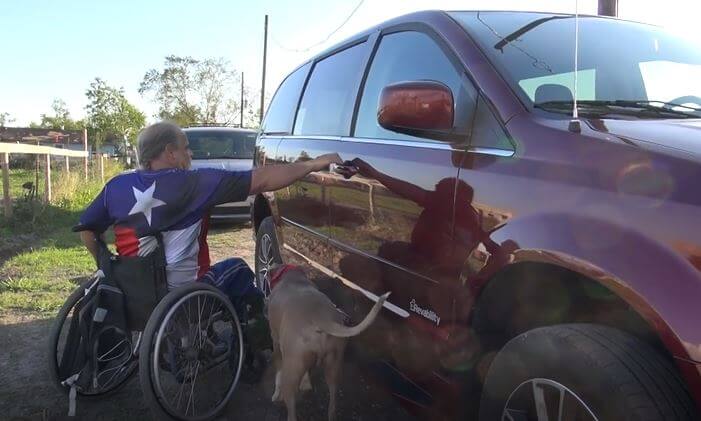 Vincent Amico checks out his new accessible van purchased at MobilityWorks
