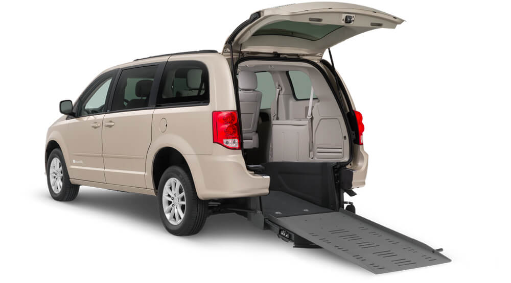 Light brown wheelchair van with rear side entry ramp
