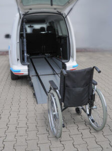 Wheelchair secured in with Easy Pull waiting to be pulled into van