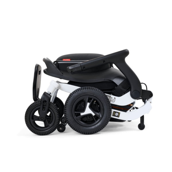 A compact, folded black and white stroller with three wheels, designed for easy transport and storage.