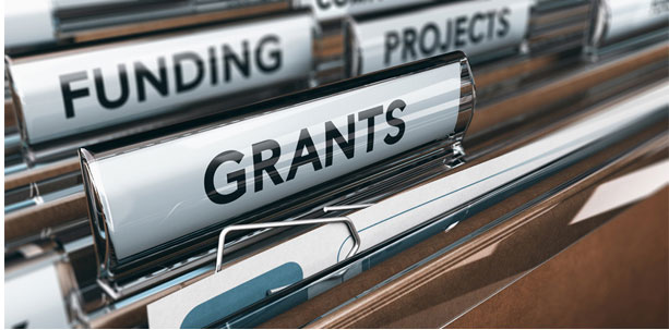 File folders with Grants and Funding titles