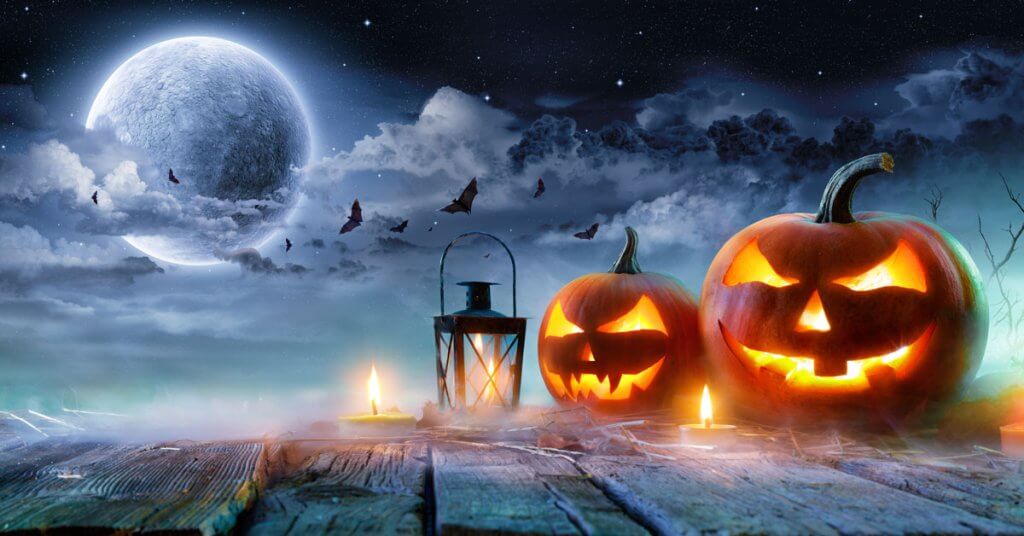 jack-o-lanterns and a full moon
