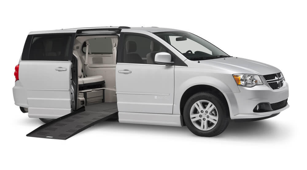 Silver-gray wheelchair van wheelchair with a manual ramp from the side view