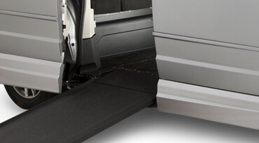 Close up of slightly inclined manual ramp on a wheelchair van 