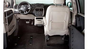 Posterior perspective of the interior of a wheelchair van without driver and back seats