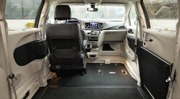 The interior of a wheelchair van without passenger and back seats 